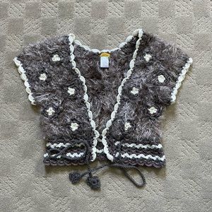 Adorable Never worn shrug.  Neiman Marcus